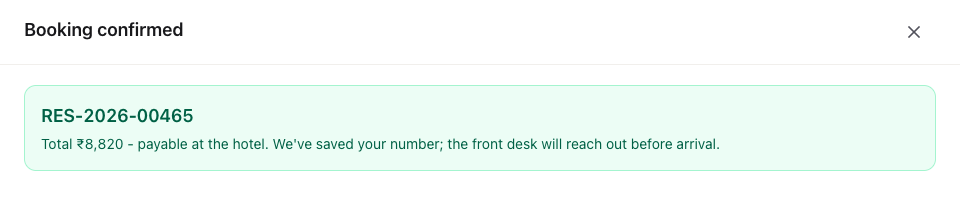 Booking confirmed: the booking number and the total, payable at the hotel